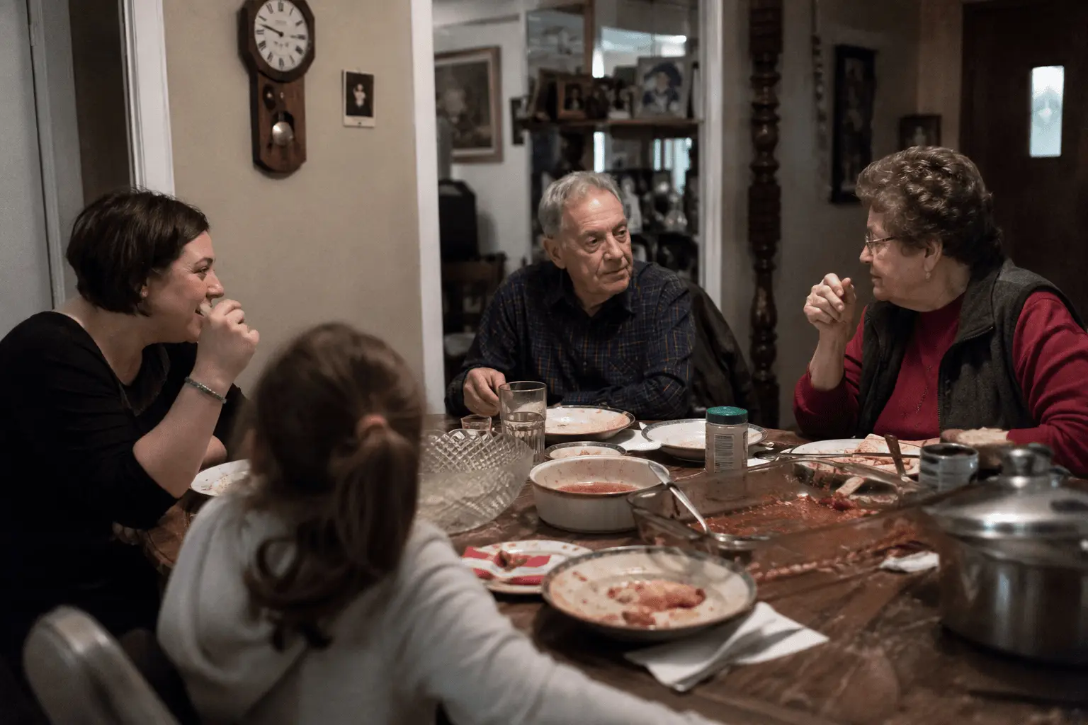 Family gathered around a dinner table