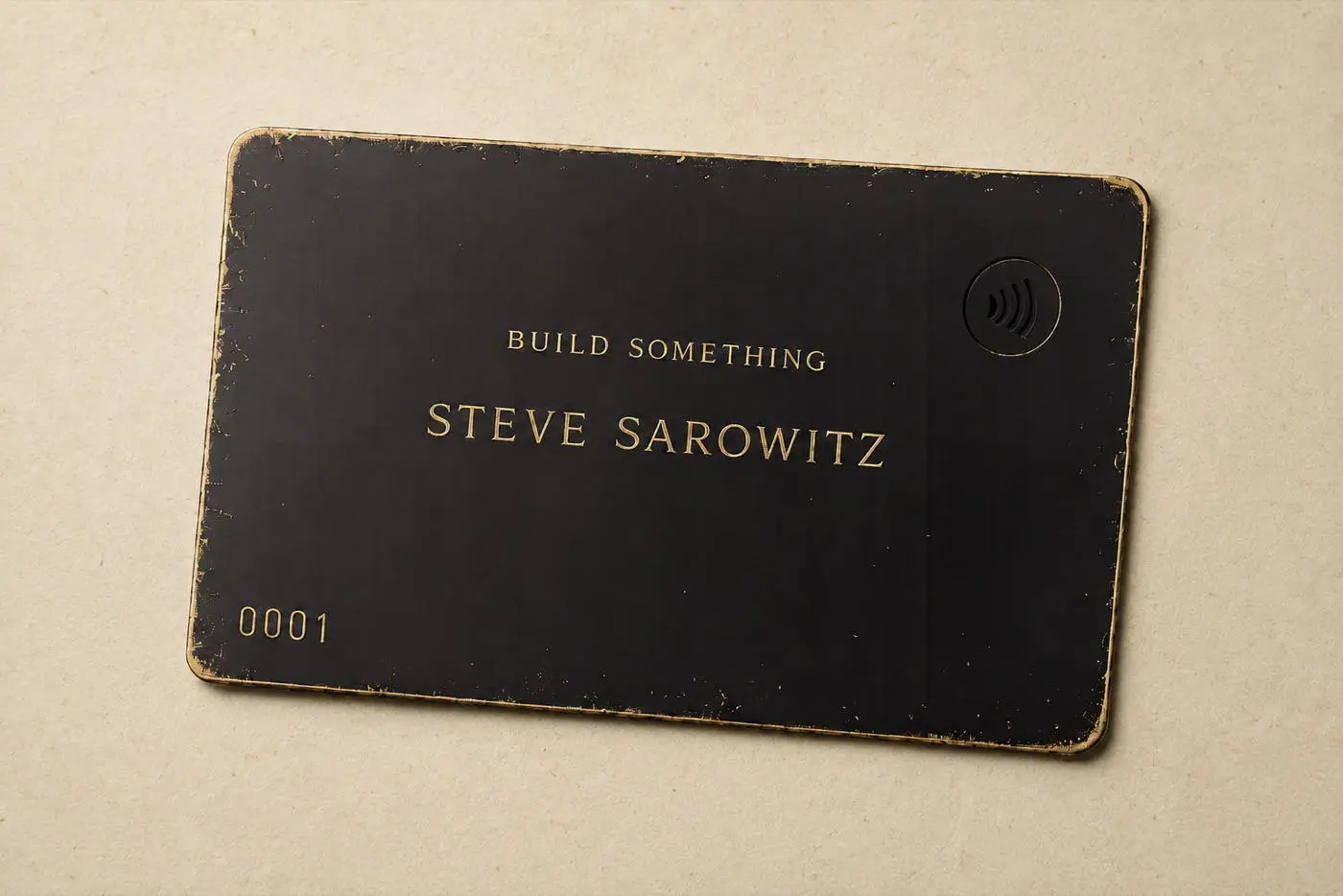 Build Something physical membership card, matte black with gold edges, engraved Steve Sarowitz, numbered 0001, founding member.