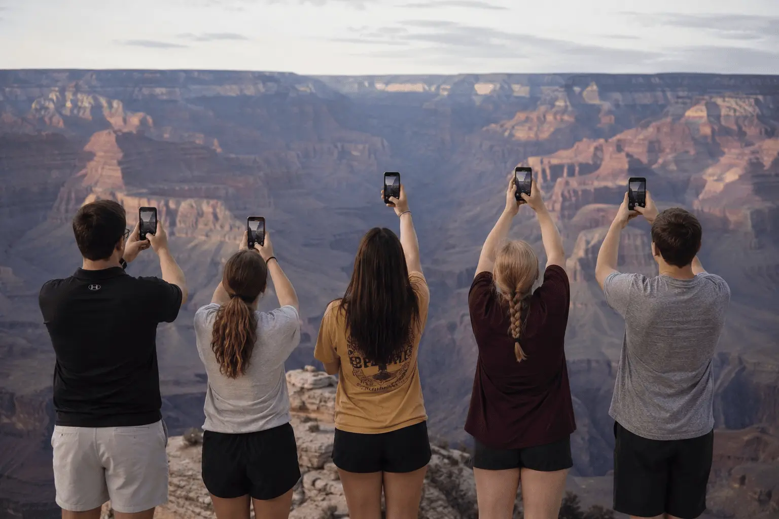 Visitors photographing the Grand Canyon with their phones